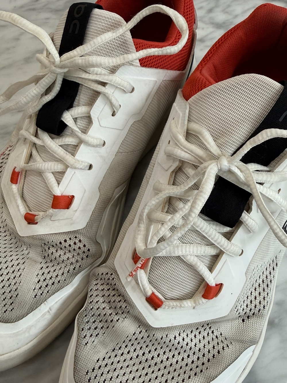 On Running Men’s White Sneakers with Red Accents